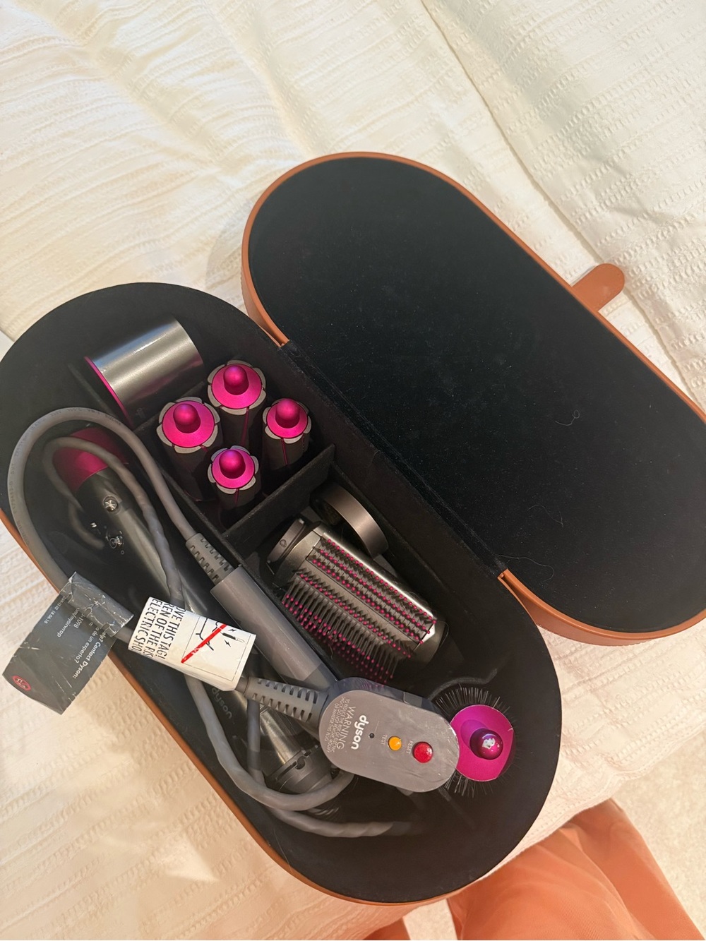 Dyson styling set in Black and Fuchsia accents